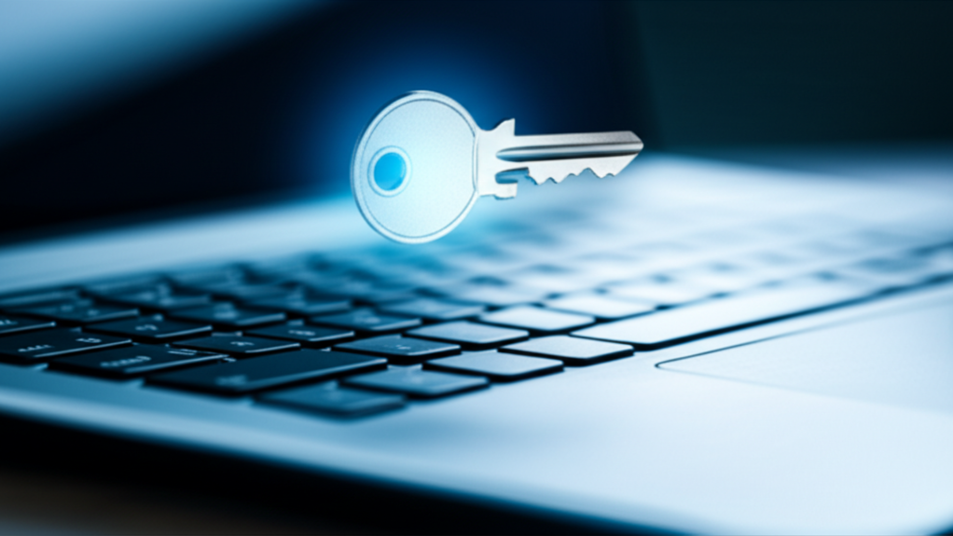 A secure digital key hovering over a laptop keyboard with a soft blue glow, symbolizing digital secu