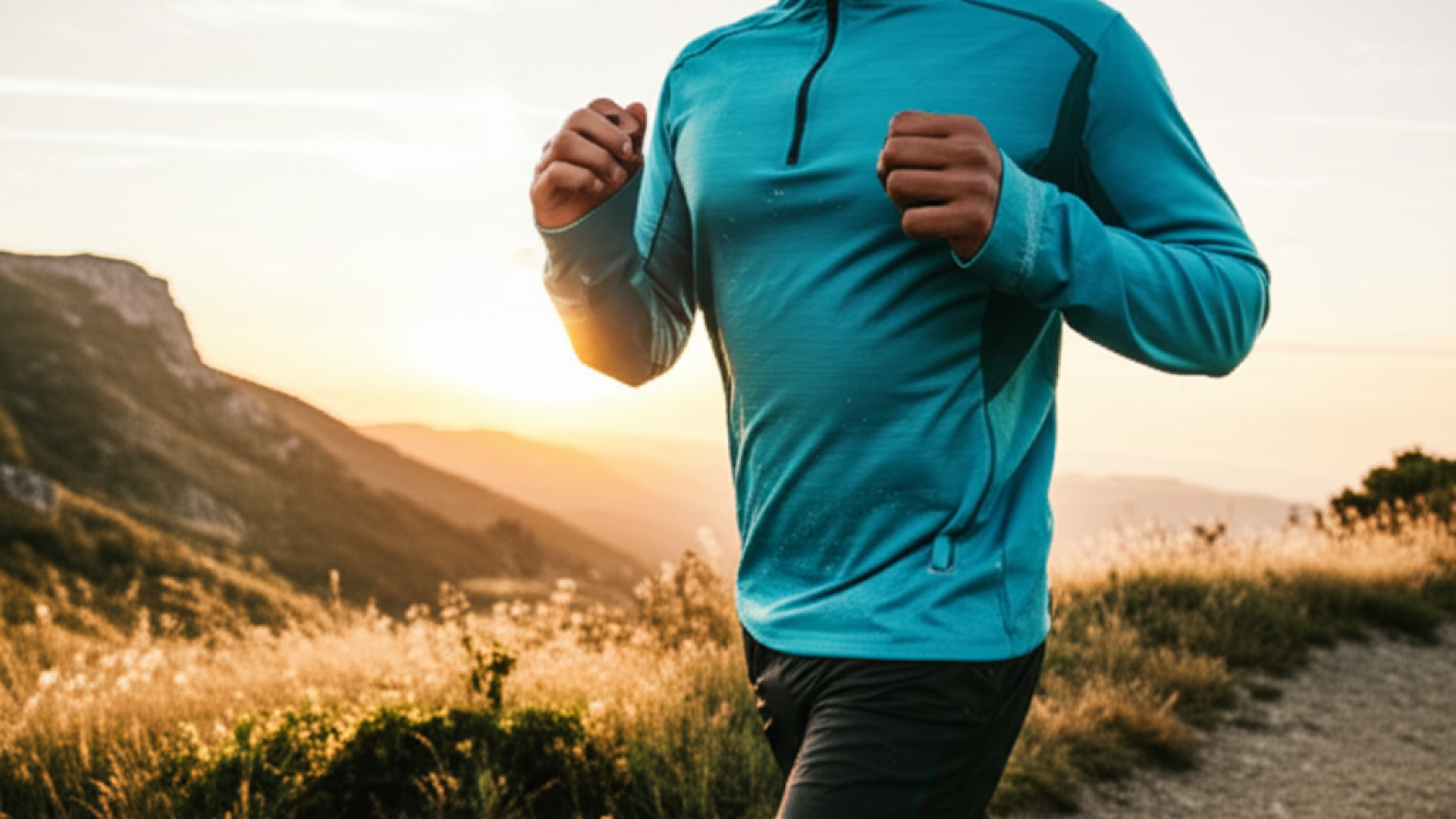 A professional runner exercising on a mountain trail at sunrise, wearing sleek performance athletic